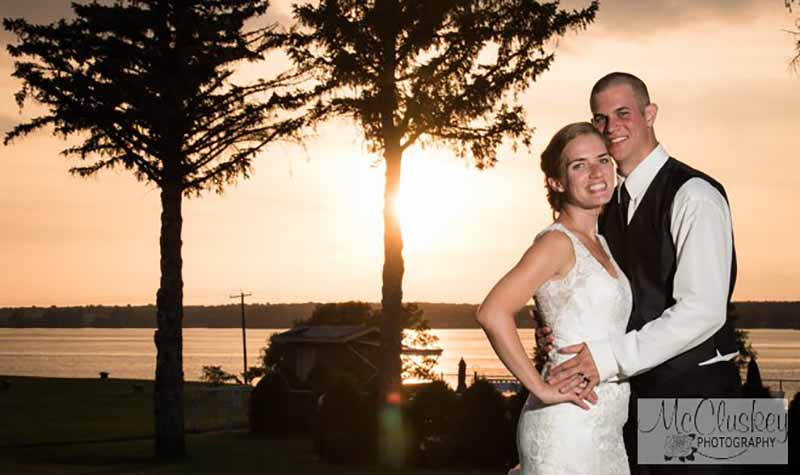 Bride and groom at sunset