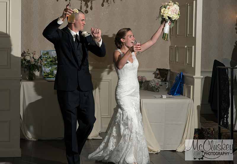 Bride and groom entering with drinks