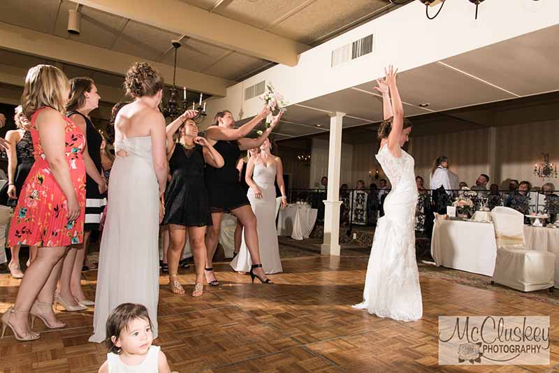Bride throwing the bouquet