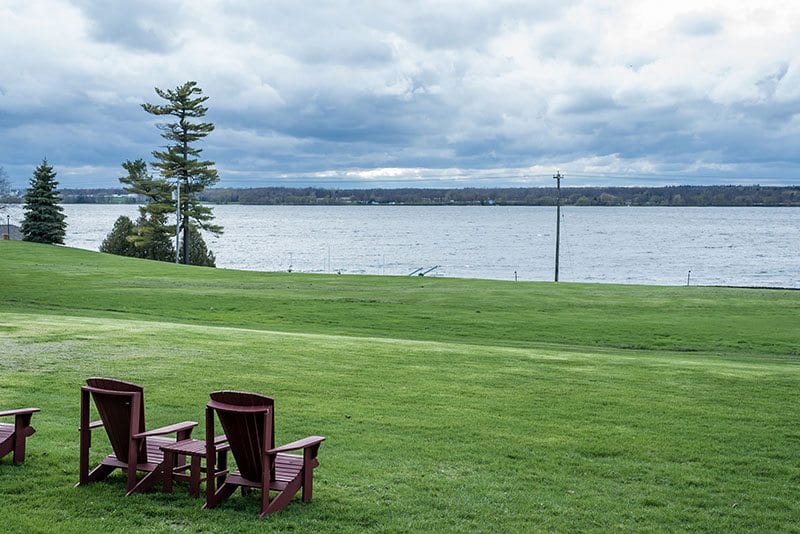 Riverside grounds with outdoor seating Riverside grounds with outdoor seating