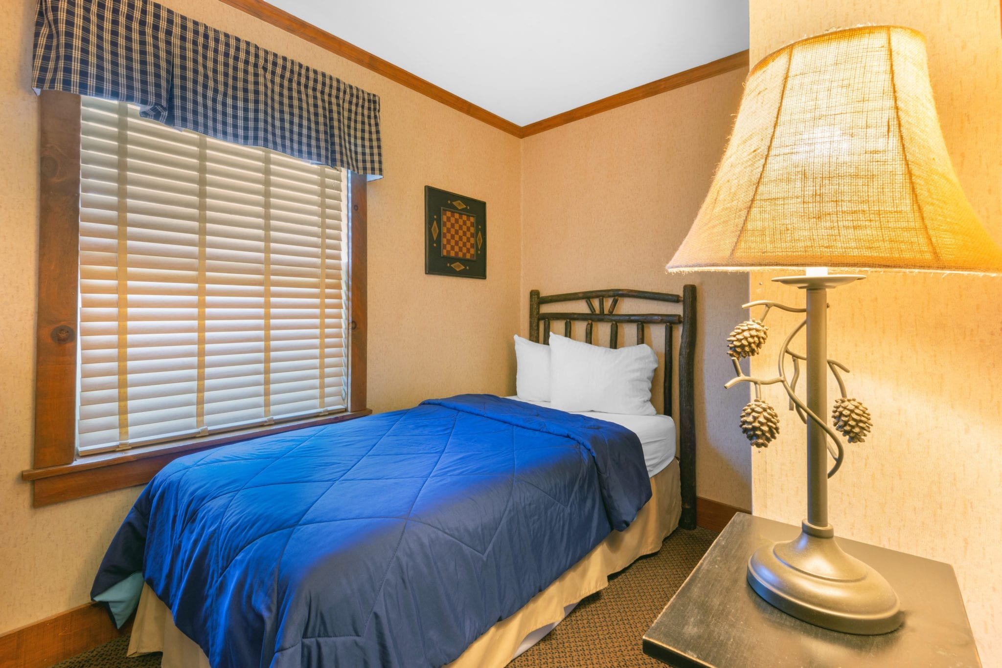 Cottage bedroom with single bed.