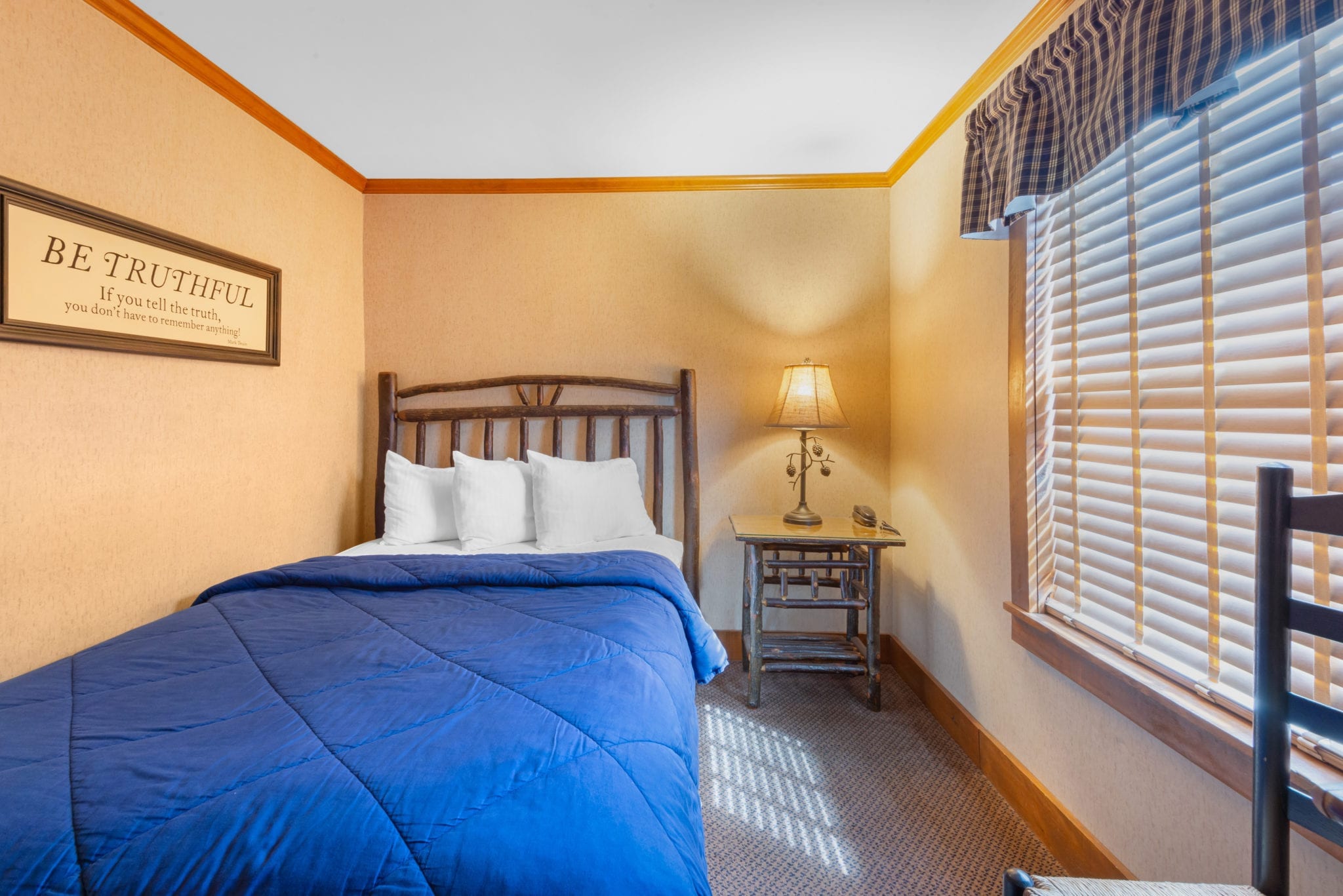 Cottage bedroom with single bed.