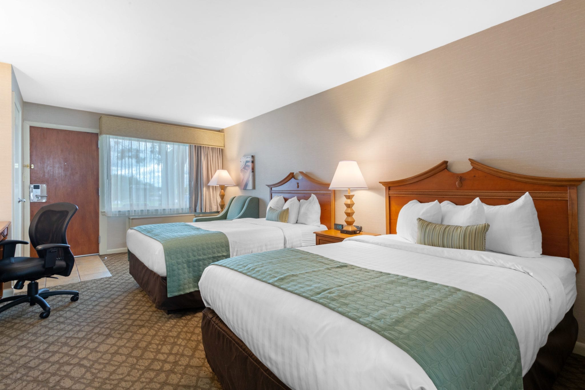 Bedroom with two queen beds.